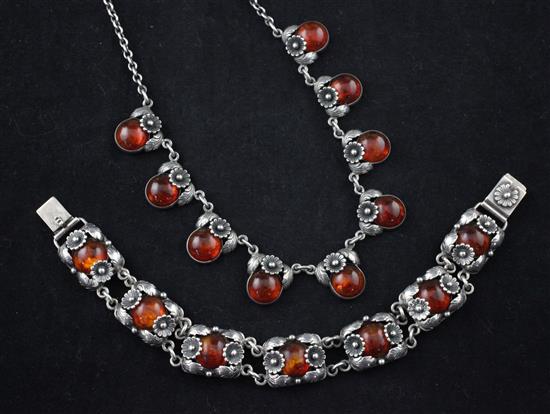 A suite of Danish sterling silver and amber jewellery by Niels Erik From, 16in & 7.75in.